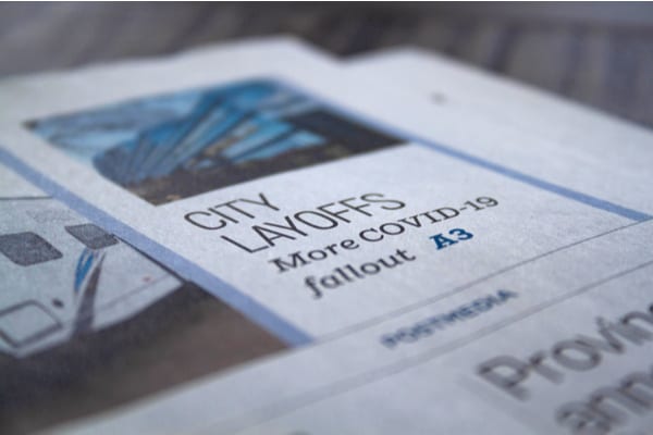 partial plan termination newspaper headline on layoffs