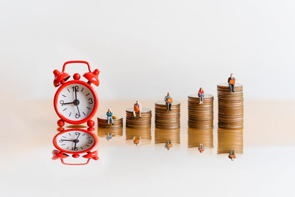 time concept money growing retirement planning pre-tax vs. roth