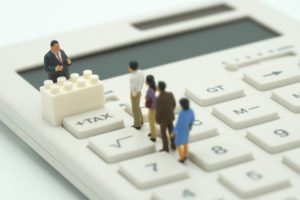 amt stock options concept of people lined up to calculate tax bill