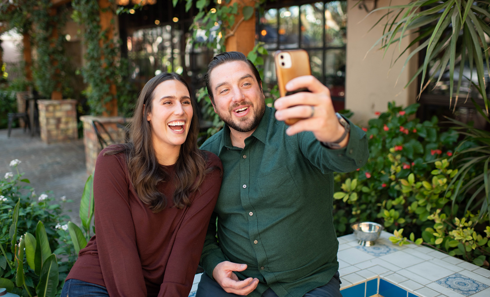 brighton jones careers two teammates taking a selfie