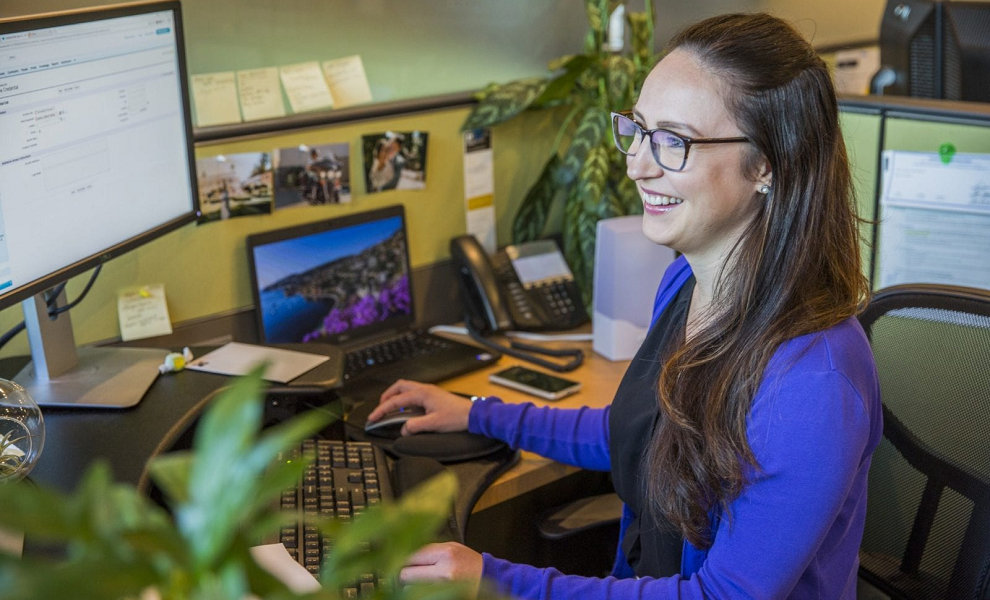 brighton jones team approach staffer at desk